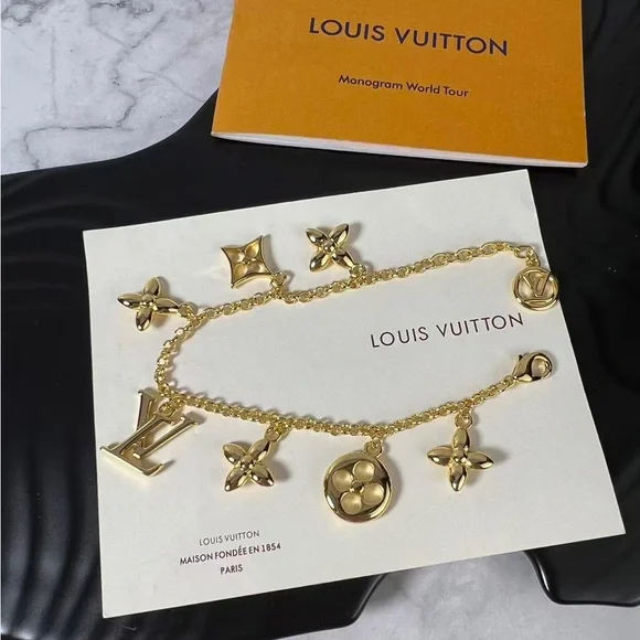 Louis Vuitton Gold Charm Bracelet with Iconic Motifs